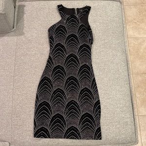 Speechless bodycon glitter dress fromMacy’s  with cutout on back